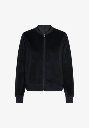 Navy blue bomber jacket made from soft velvet fabric, featuring a zip front, ribbed cuffs, and a classic rounded collar design.