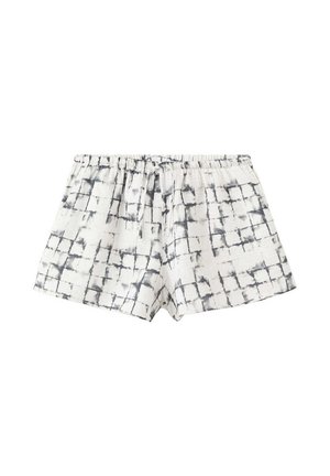 Shorts en coton blanc avec motif à grille noire et taille élastique avec cordon, posés à plat sur un fond blanc.