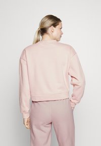 Puma LOUNGEWEAR SUIT  - Tuta - rose quartz