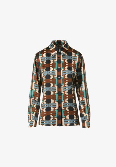 Long-sleeve shirt featuring a bold geometric chain-pattern in browns, teal, and cream on a dark navy background; button closure and collar.