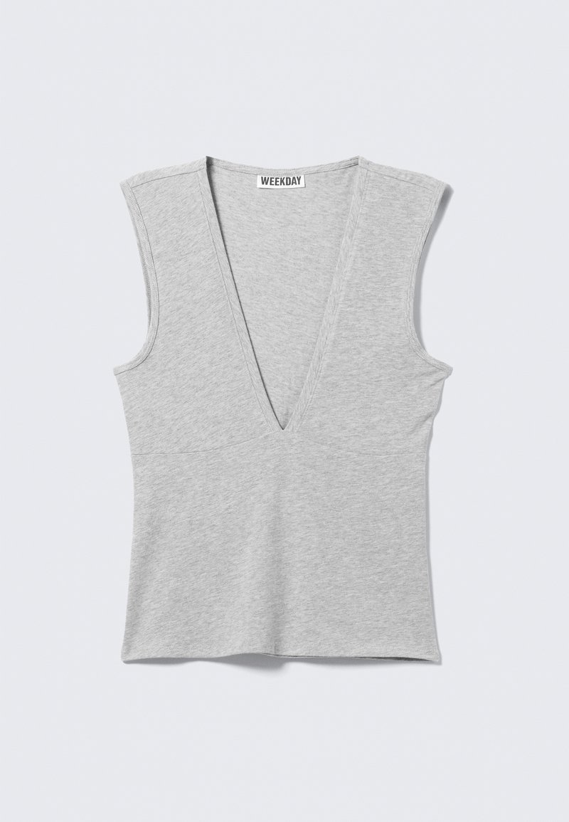 Sleeveless light gray knit top with deep V-neck and a fitted waist, labeled "WEEKDAY" inside the collar.