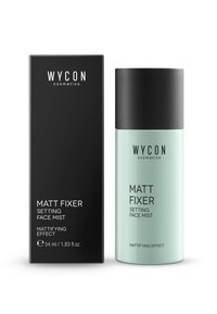 WYCON Matt Fixer, spray fissante per il viso, in un flacone verde menta con un tappo nero, confezionato in una elegante scatola nera. Formato da 54 ml.