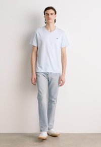 Lacoste Basic póló - bleu clair