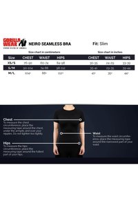 Tabulka velikostí černé bezešvé podprsenky s měřeními v centimetrech a palcích. Obsahuje pokyny pro měření obvodu hrudníku, pasu a boků.