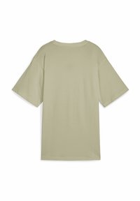 T-shirt oversize verde chiaro realizzato in tessuto morbido, con maniche corte e scollo a girocollo. Nessun motivo o accentuazione visibile.