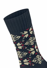 Calzino blu scuro con un bordo a coste. Presenta un motivo intrecciato in crema e rosso, che ricorda fiocchi di neve e forme geometriche.