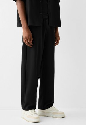 Pantalon de survêtement - black