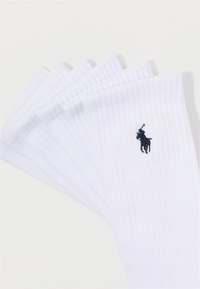 Λευκές ραβδωτές κάλτσες από βαμβακερό μείγμα, με μικρό ναυτικό λογότυπο. Το σετ περιλαμβάνει πολλές ζευγάρια τοποθετημένα μαζί.