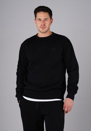 Schwarzer Sweatshirt aus Baumwollmischung, mit Rundhalsausschnitt, gerippten Bündchen und Saum sowie einem kleinen geprägten Logo auf der Brust.