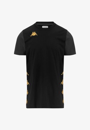 T-shirt nero a maniche corte in cotone. Presenta il logo Kappa dorato sul petto e dettagli eleganti lungo i lati. Texture morbida.