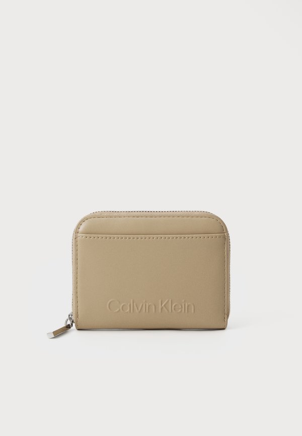 EMBOSSED LOGO MEDIUM ZIP AROUND - Wallet - crockery