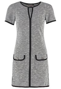 Šaty s krátkým rukávem v černobílém herringbonovém vzoru, s předním zipem, kulatým výstřihem a dvěma velkými předními kapsami s akcenty.