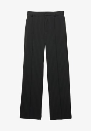 Svarta mycket tunna randiga skräddarsydda byxor med raka ben, bälteshällor och dragkedja fram.