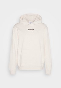 Beige Kapuzenpullover mit einer Fronttasche, versehen mit einem kleinen schwarzen Adidas-Logo auf der Brust. Aus weichem, strukturiertem Material gefertigt.