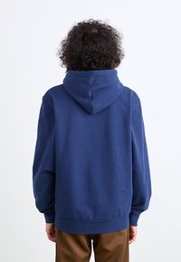 Navy blue hoodie made from soft fabric, features a kangaroo pocket, ribbed cuffs, and a drawstring at the hood. Relaxed fit and simple design.