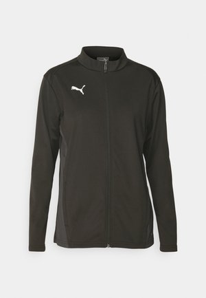 Schwarze Zip-Jacke aus glattem, leichtem Material. Verfügt über einen hohen Kragen, lange Ärmel und ein weißes Puma-Logo auf der Brust.