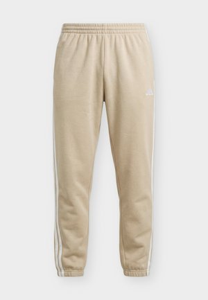 adidas Sportswear, ESSENTIALS 3 STRIPES TAPERED CUFFED PANTS - Παντελόνι φόρμας - khaki three/white