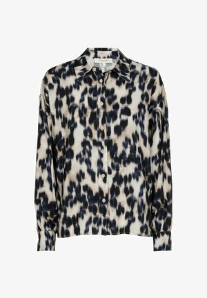 Button-up shirt with an abstract black and cream pattern. Features a pointed collar, long sleeves, and a relaxed fit. Soft fabric texture.