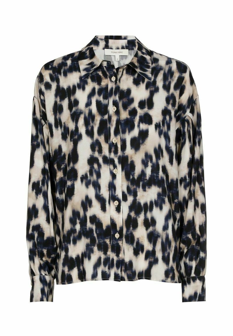 Knoopshirt met een abstract zwart en crème patroon. Heeft een puntige kraag, lange mouwen en een relaxte pasvorm. Zachte stoftextuur.