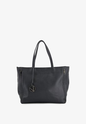 Zwarte leren tote bag met ritssluitingen aan de zijkanten, dubbele handvatten en een cirkelvormig logo-accent. Geweven oppervlak met een ruime interieurontwerp.