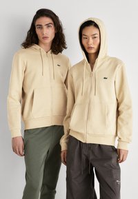 Lacoste - Sweater met rits - beige Miniatuurafbeelding 1