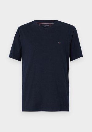 Navyblauwe katoenen T-shirt met een V-hals, korte mouwen en een klein logo op de linker borst. Gladde textuur en een standaard pasvorm.
