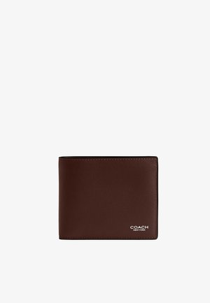 Brown leather bifold wallet with "Coach New York" logo embossed in white on the lower right corner against a white background.