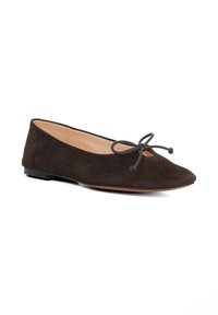 Brown suede ballet flat with a pointed toe, adjustable bow detail at the front, and a low black rubber sole.