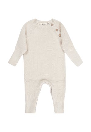 Cremfarbener gestrickter Baby-Overall mit langen Ärmeln und drei Knöpfen an der linken Schulter, Größe 56 Etikett sichtbar.