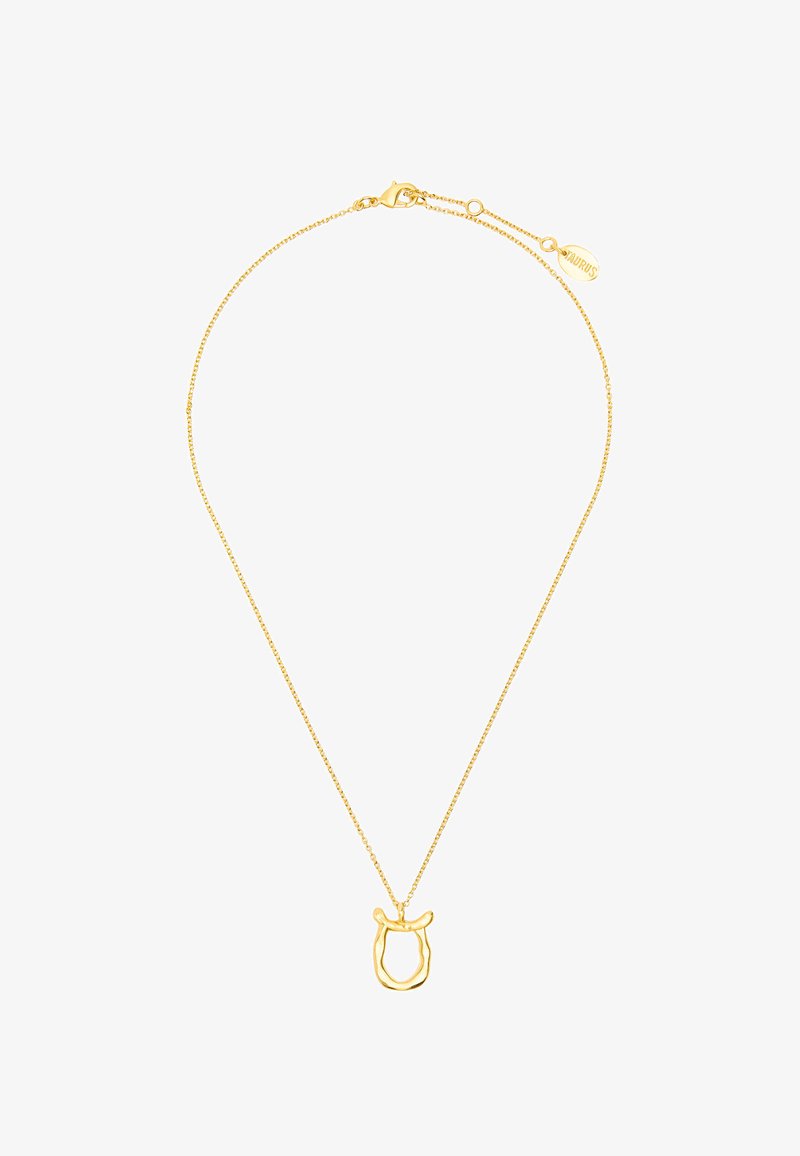 Złoty metalowy naszyjnik z cienkim łańcuszkiem oraz teksturowanym wisiorkiem w kształcie stylizowanej twarzy, z zapięciem i metką marki.