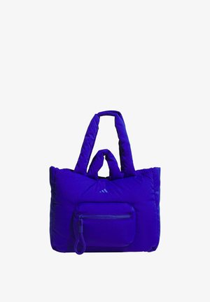 Borsa tote imbottita viola con doppi manici, tasca frontale con zip e texture di tessuto liscia. Presenta un dettaglio di branding discreto sul davanti.