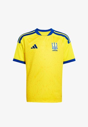 Gelbes und blaues Sporttrikot mit dem Emblem der Ukraine und dem Adidas-Logo, mit geometrischen Mustern und blauen Streifen an Schultern und Ärmelsäumen.