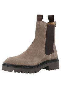 Brauner Chelsea-Stiefel aus Wildleder mit elastischen Seitenteilen, einer strukturierten Gummisohle und einer abgerundeten Spitze. Verfügt über gestickte Details und Zugschlaufen.