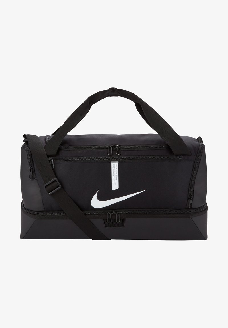 Borsa da palestra Nike nera con compartimenti a doppia zip, tracolla regolabile e logo bianco prominente sul davanti. Realizzata in tessuto resistente.