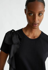 LIU JO WITH RUCHING - T-shirt con stampa - black
