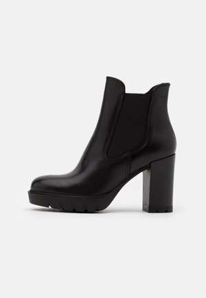 Højhælede støvletter - black