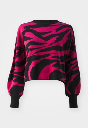 Pulover scurt în negru și roz, având un model îndrăzneț în zigzag. Confectionat din material tricotat, cu mâneci largi și manșete cu nervuri.