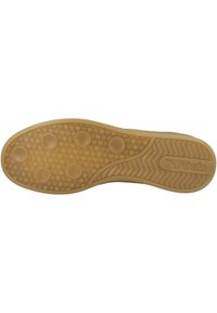 Semelle de chaussure en caoutchouc beige clair avec des motifs de grip ronds et une zone de talon texturée arborant le logo Gola.