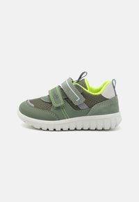 Green sneakers with mesh and suede materials, featuring Velcro straps, a white rubber sole, and neon yellow accents.