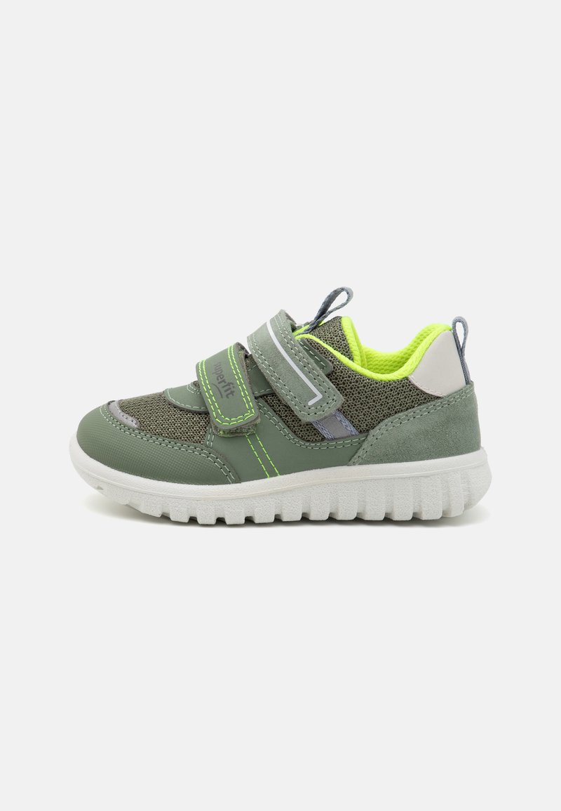Green sneakers with mesh and suede materials, featuring Velcro straps, a white rubber sole, and neon yellow accents.
