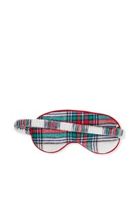 Maschera per dormire a scacchi realizzata in morbido tessuto con motivi rossi, verdi e blu. Include un cinturino in tessuto bianco elasticizzato per il massimo comfort.