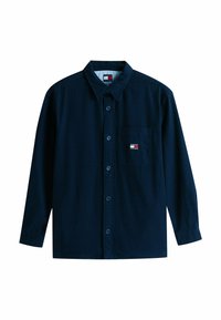 Camicia azzurra con bottoni, maniche lunghe, colletto a punta, taschino sul petto con un piccolo logo e una texture di tessuto liscia.
