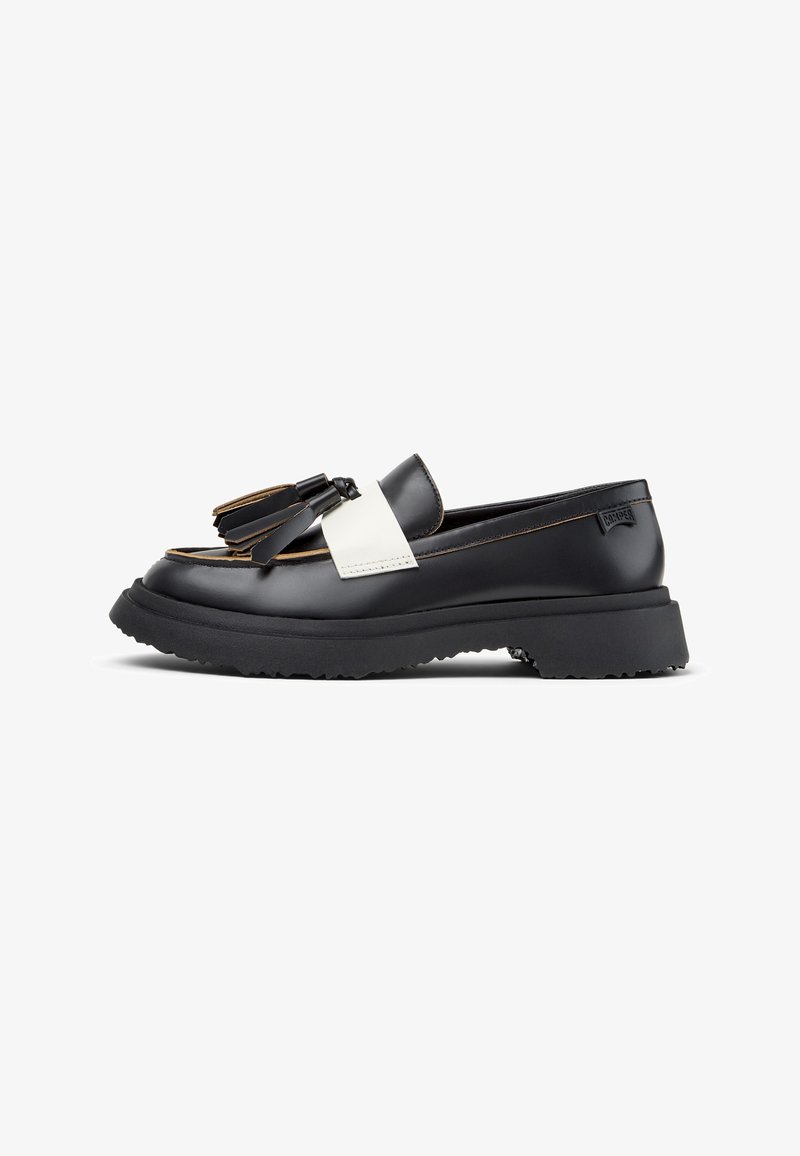 Schwarzer Lederloafer mit weißem Akzent über dem Spann, verziert mit einer dekorativen Quaste. Dicke Gummisohle mit strukturiertem Gripmuster.