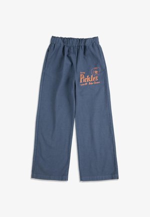 Blue elastic waist pants with wide legs, featuring orange text and a dog illustration labeled "Pickles" on the right thigh.