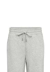 Pantaloni de trening gri cu talie ajustabilă prin șnur, talie ribbată și glezne cu mansete. Realizați dintr-un material moale cu o textură netedă.