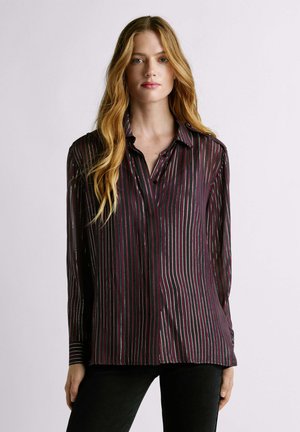 Long-sleeve shirt in dark burgundy, featuring vertical stripes in metallic pink and white. Button-down collar and cuff details.