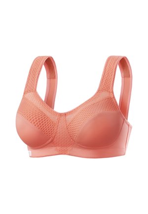 Coral pink women's bra with textured mesh panels, wide adjustable straps, and full coverage cups on a white background.