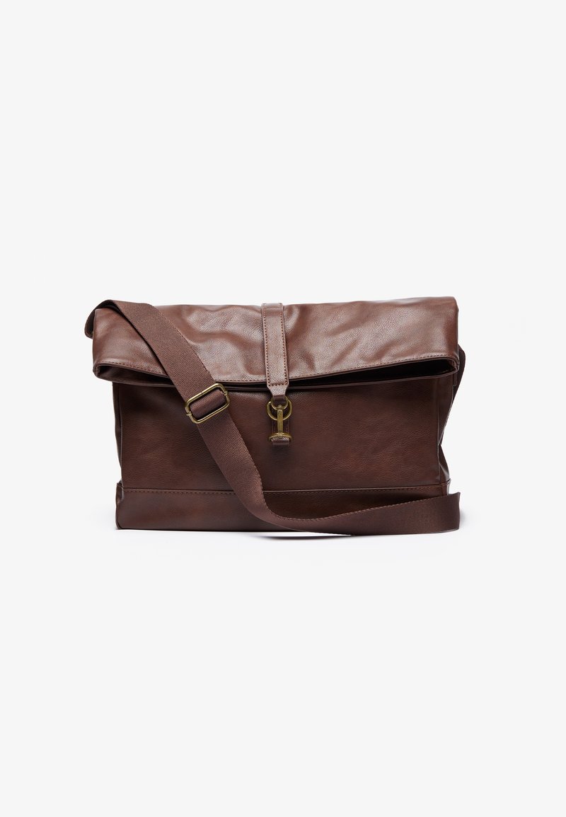 Brown leather messenger bag with a fold-over flap, adjustable strap, metal hardware, and a smooth finish. Includes a front closure with a loop.