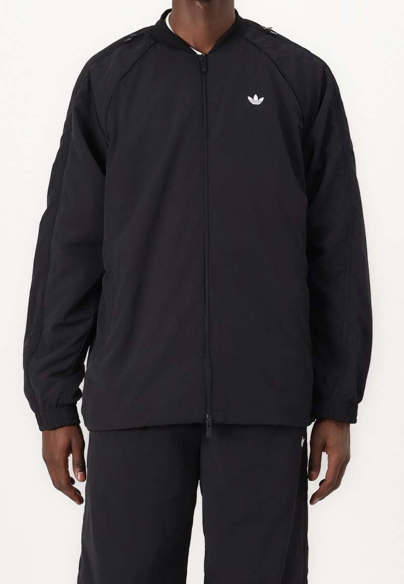 Adidas Originals Light Jacket Black Pre owned Zalando adidas-originals-light-jacket-black-pre-owned-zalando