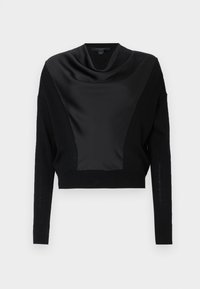 Maglione corto nero con collo a scialle in satin, maniche lunghe e lavorazione a maglia testurizzata. Il corpo presenta un dettaglio a finitura opaca contrastante.